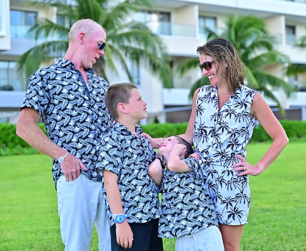 Dr. Maclain Magee with her husband and two sons